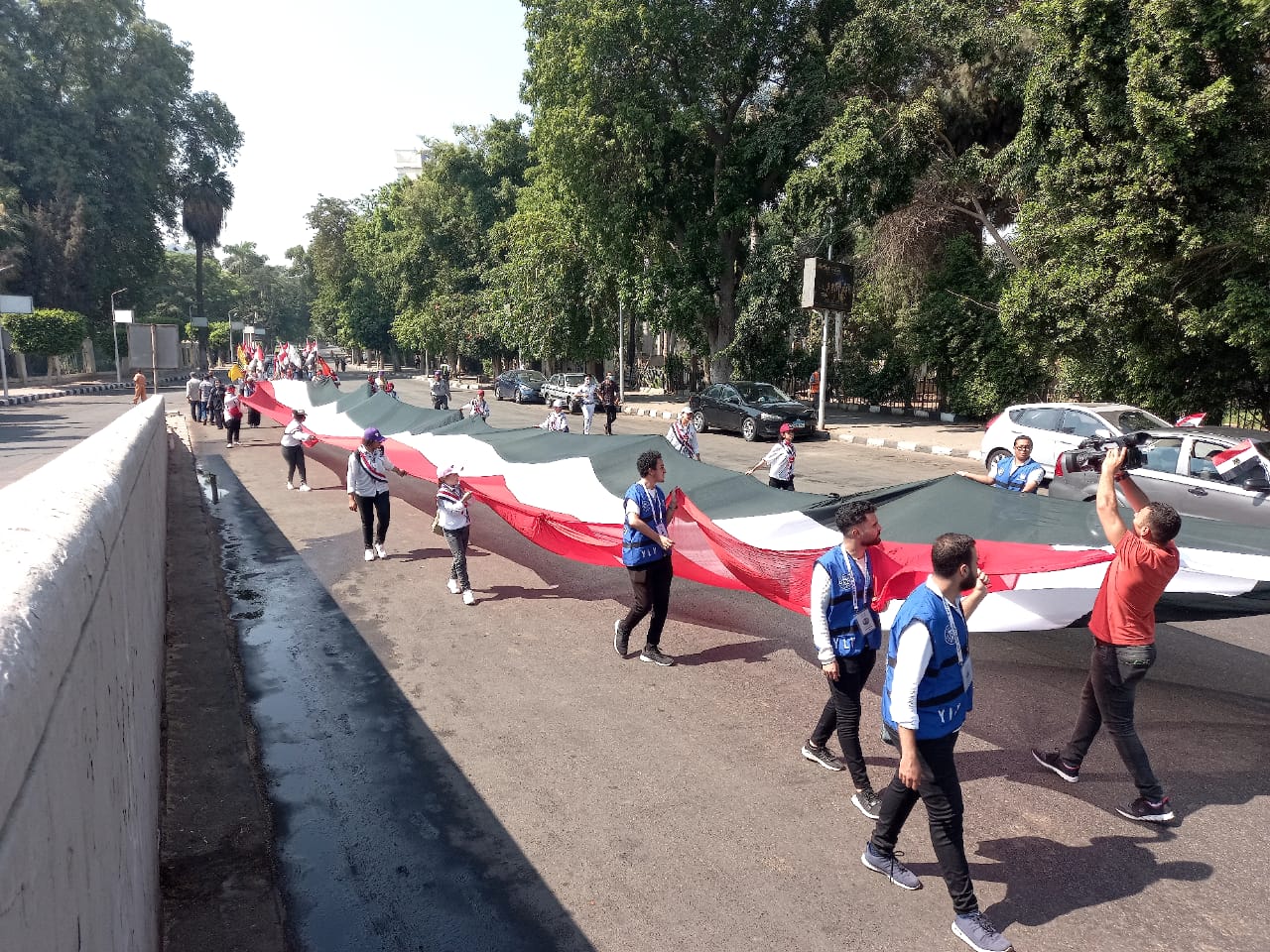 بحضور وزير الشباب مسيرة شبابية احتفالا "بذكرى ثورة 30 يونيو وعيد القاهرة القومى"