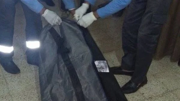 الطب الشرعى يفحص جثة شاب متفحمة فى الوراق