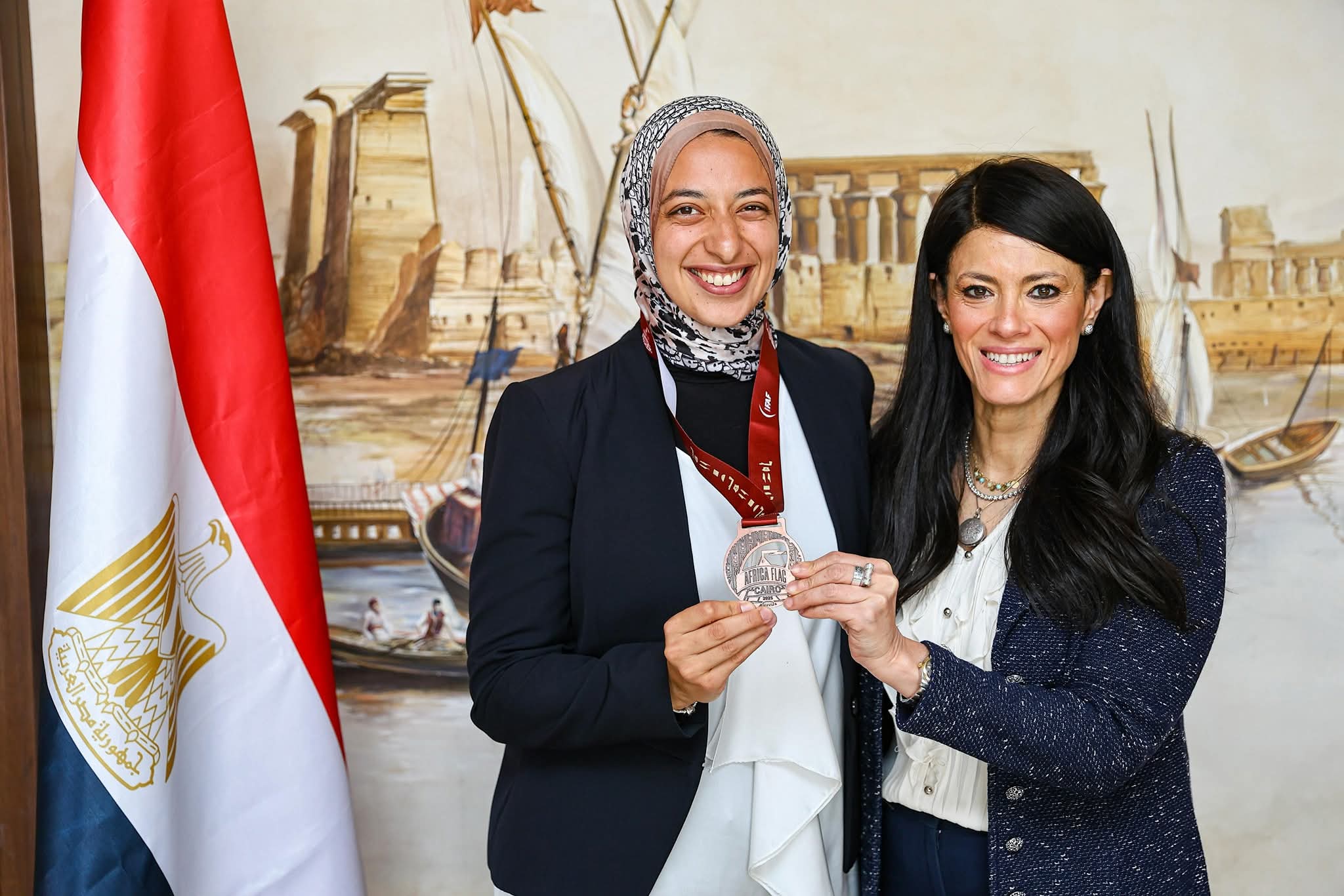 - وزيرة التخطيط والتنمية الاقتصادية والتعاون الدولي تُشارك في الاحتفال بـ «اليوم الأولمبي» وتُكرم لاعبة مصر بعد فوز منتخب السيدات بالميدالية البرونزية لأول بطولة أفريقية لـ «كرة القدم الأمريكية للعلم»